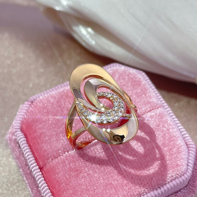 Spiral Ring in Gold and Zircons