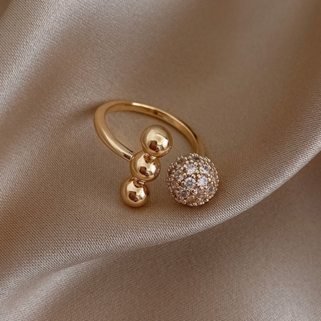 Triple Golden Sphere Ring